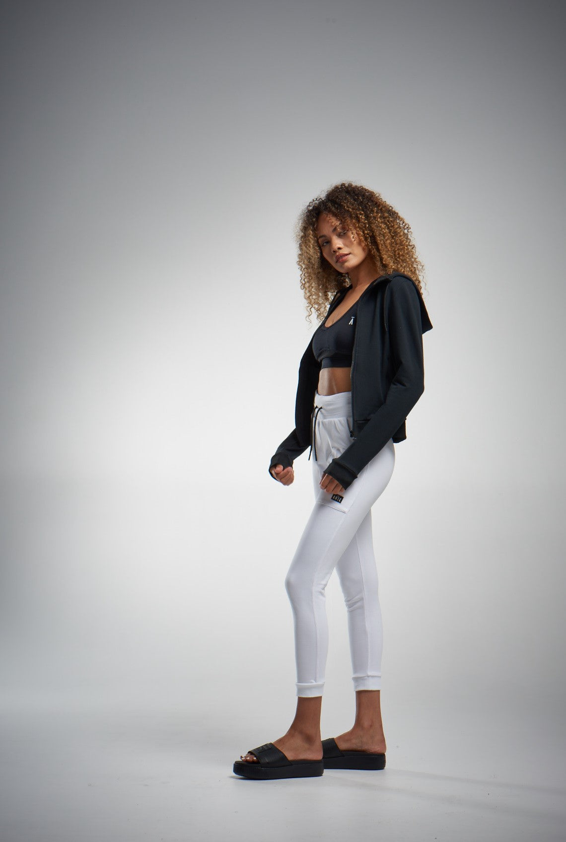 White joggers and black jackets