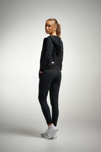 Woman in black cotton track suit
