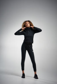 Black joggers and black hoodie