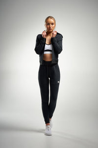 Woman in black joggers